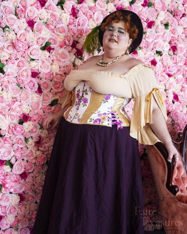 Champagne Flounced Sleeve Chemise modeled in the 3X size, with the Purple and Gold Floral Pastel Corset and the Dark Purple Linen Renaissance Skirt.