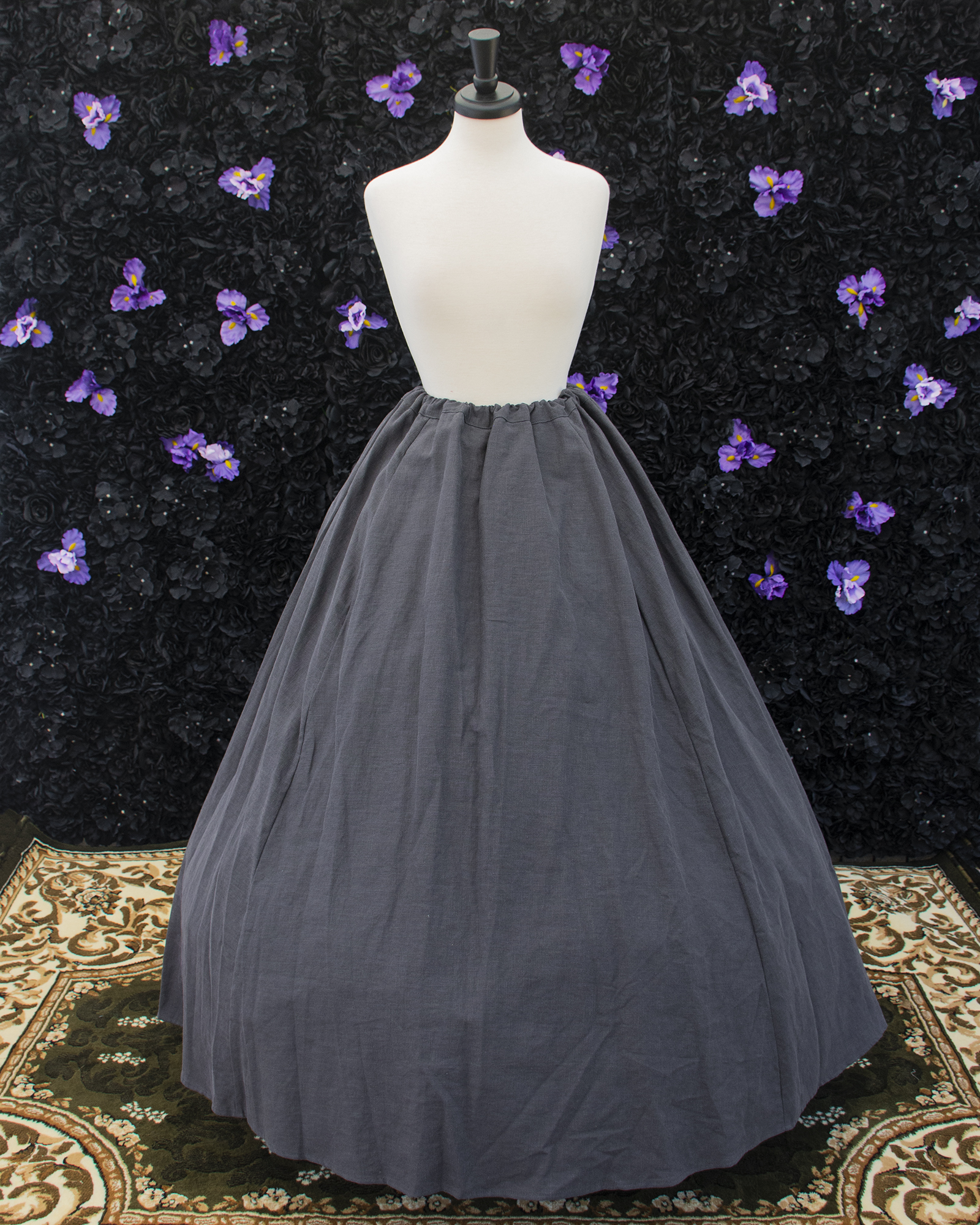 Charcoal Grey Linen Renaissance Skirt displayed on a mannequin over a hoop skirt