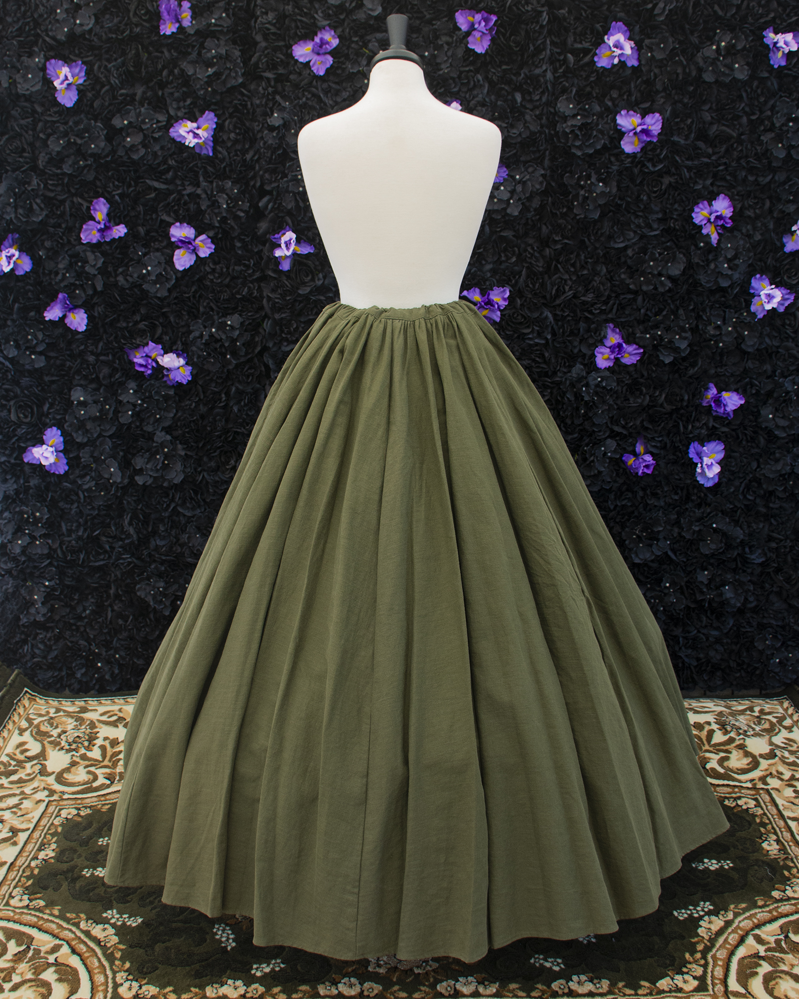 Dark Olive Green Linen Renaissance Skirt displayed on a mannequin over a hoop skirt