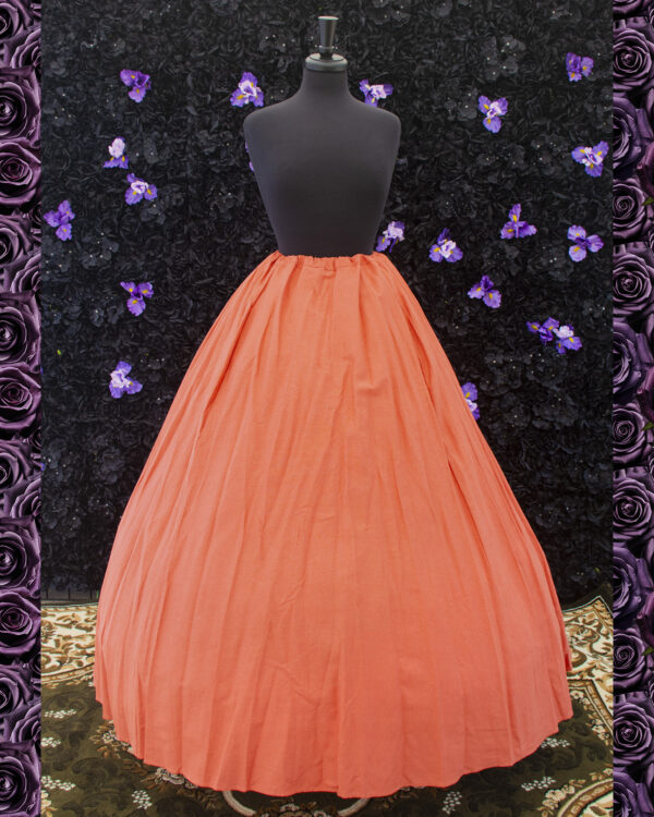 Terracotta Orange Linen Renaissance Skirt displayed on a mannequin over a hoop skirt